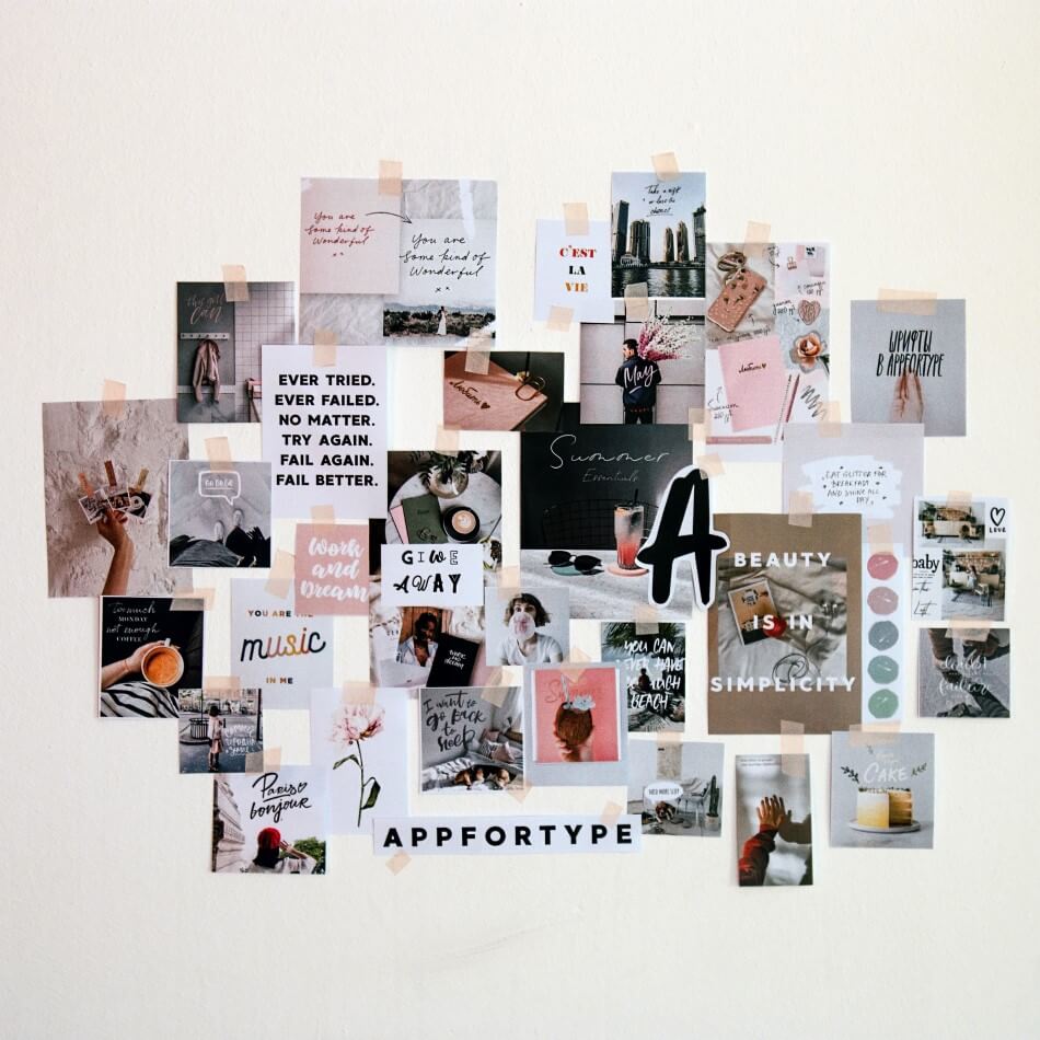 collage of photos on a wall Photo by Andy Art on Unsplash