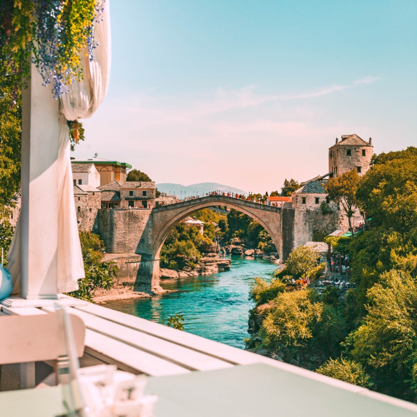 bridge, water and trees on a sunny day