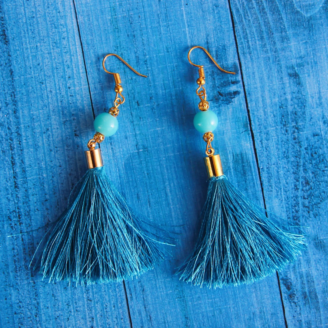 two blue earrings