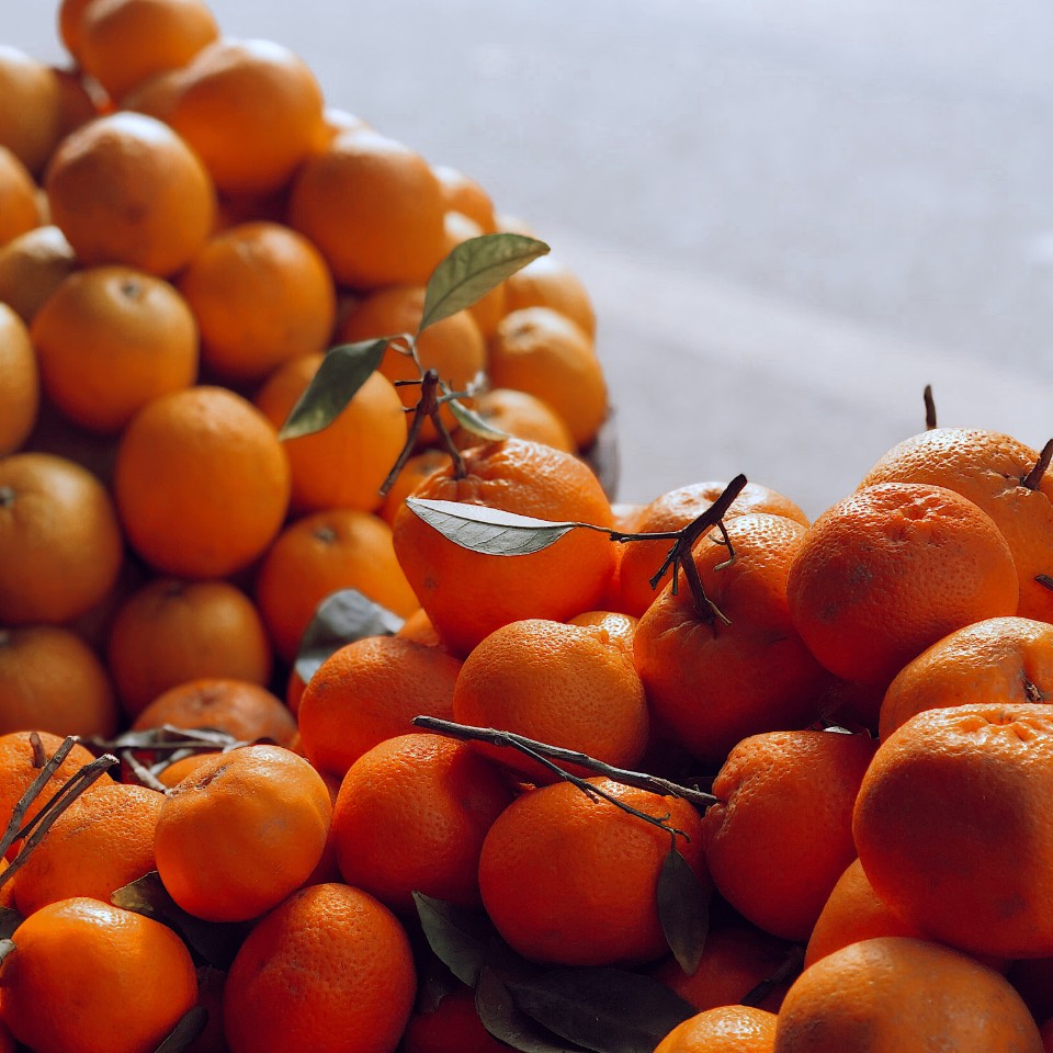 a pile of tangerines