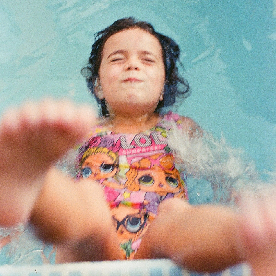 young girl in a pool